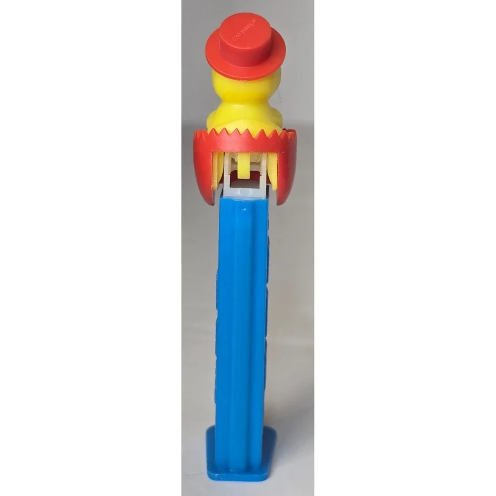 VINTAGE PEZ BABY CHICK CRACKED EGG RED TOP HAT DISPENSER W/ FEET COLLECTIBLE EUC